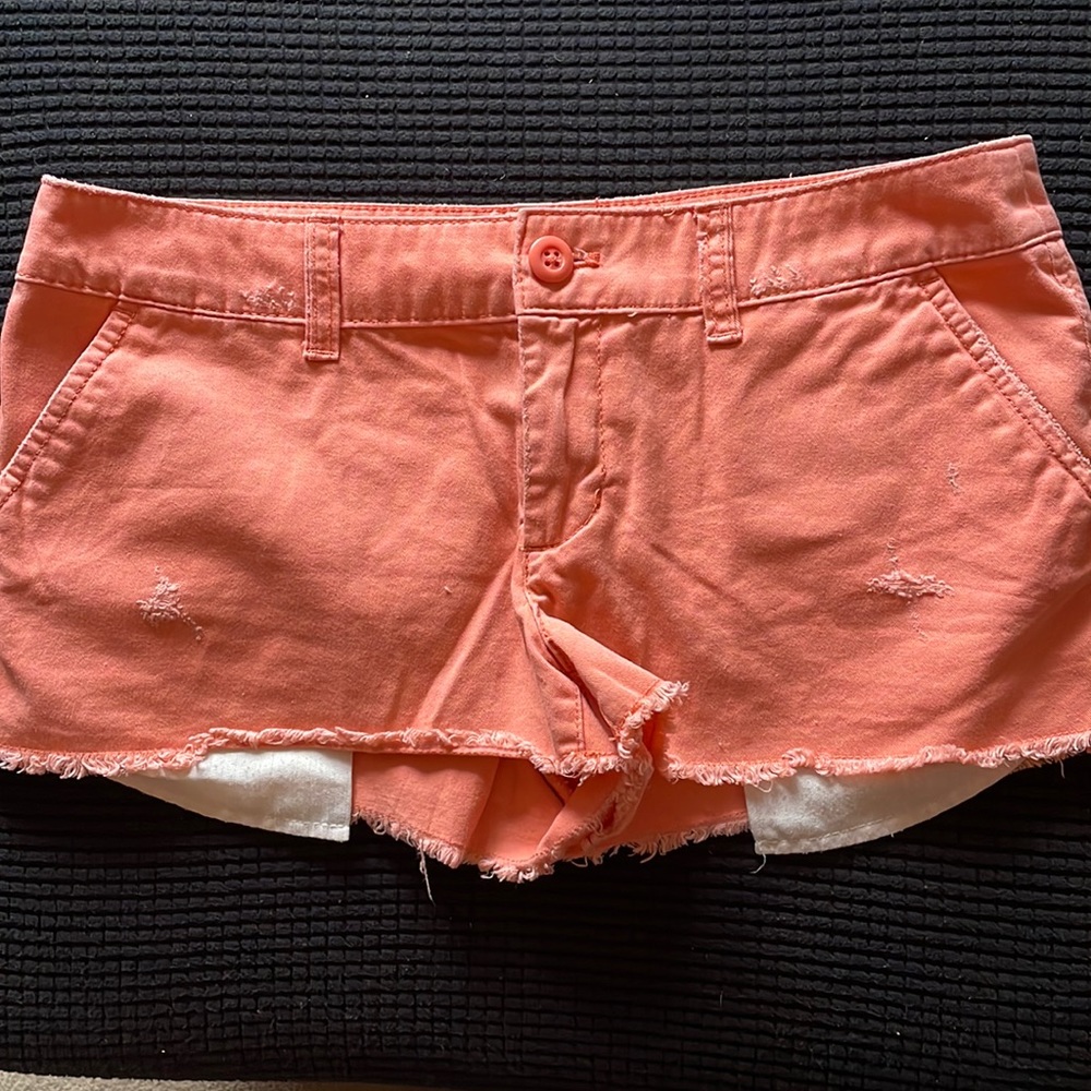 Bright orange,pinkish shorts